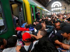 Hungary's leader says the migrant crisis facing Europe is a "German problem"