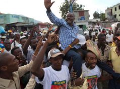 Pre-election violence flaring up in Haiti slum