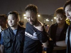 Hong Kong Police officers jailed for beating protester